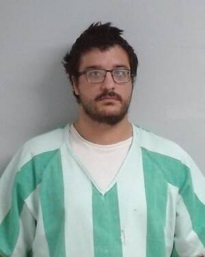 Booking photo of Camron Wayne Tambunga